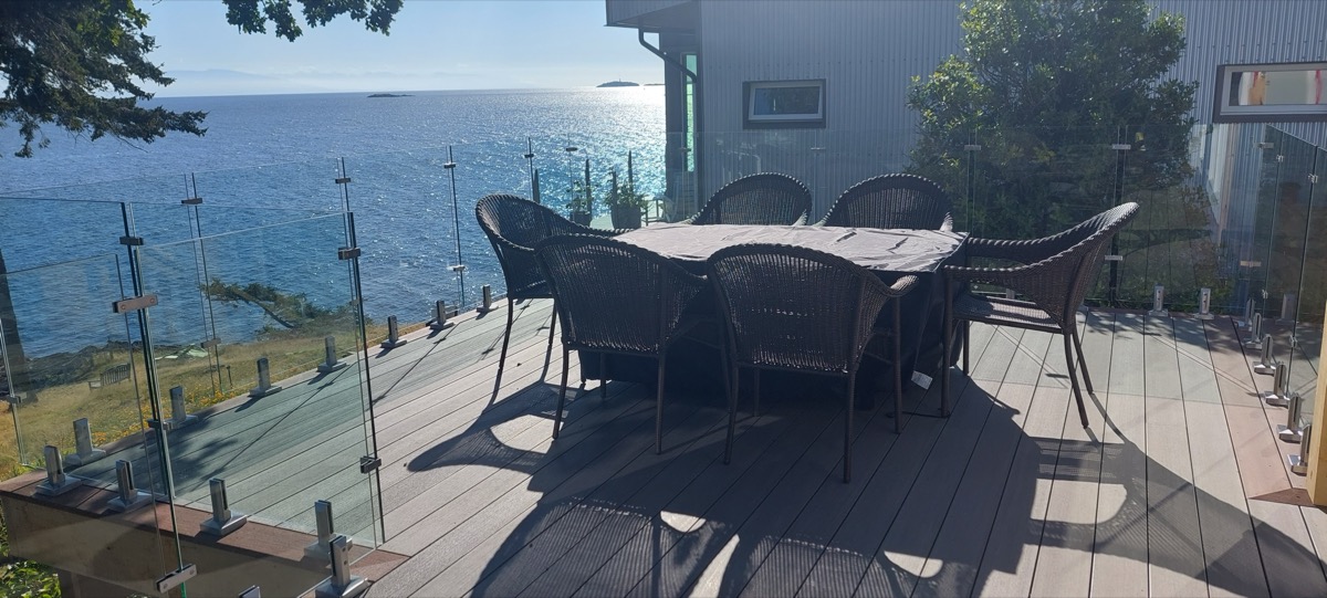 Glass railing ocean view deck
